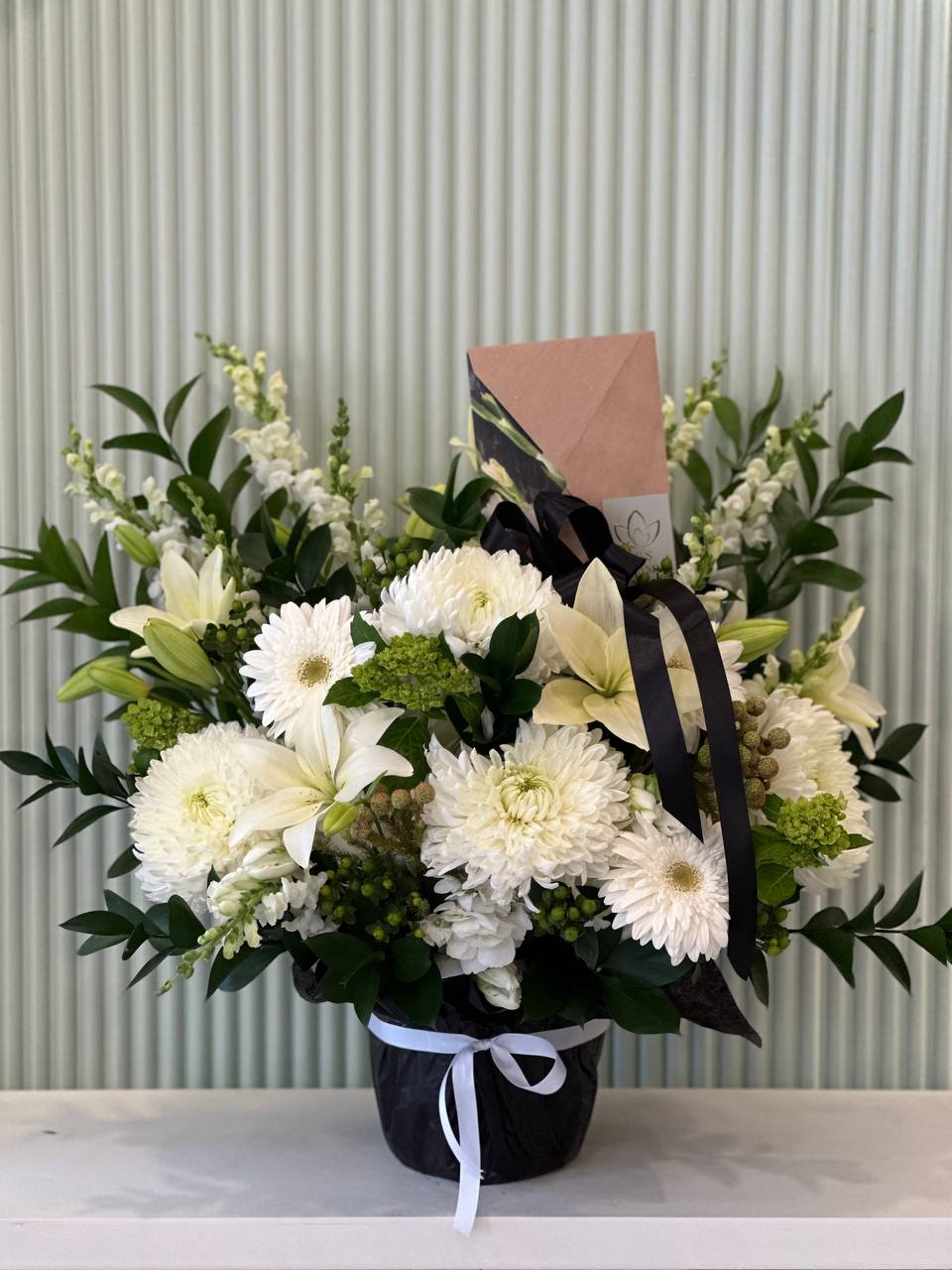 Funeral flower gift with ribbon and condolence card β same-day delivery GTA