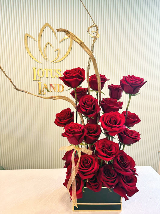 Luxury long-stemmed red roses in a black box. Romantic gifts, Valentine’s Day, anniversaries