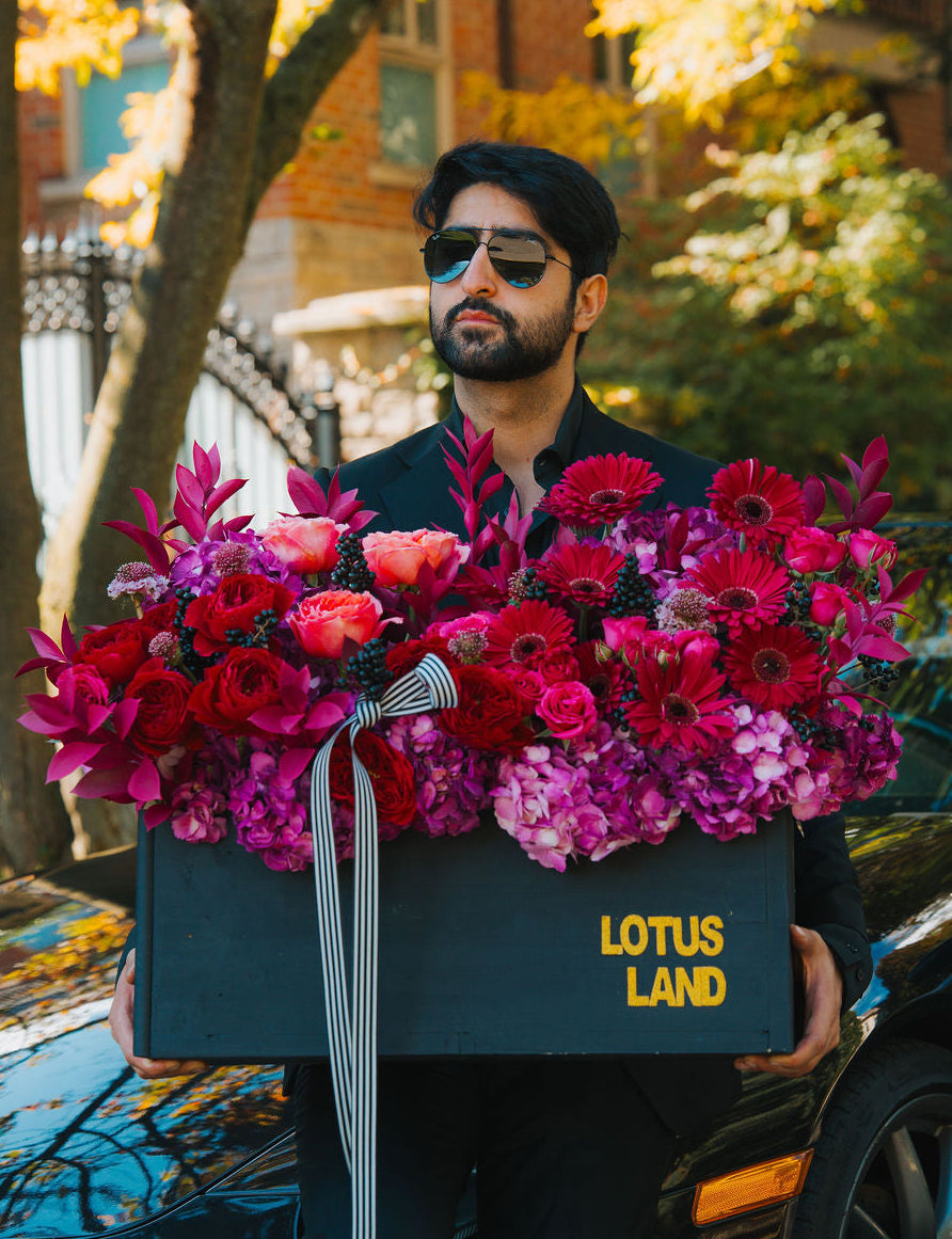 Luxury floral box arrangement in a black box with rich tones and modern elegance