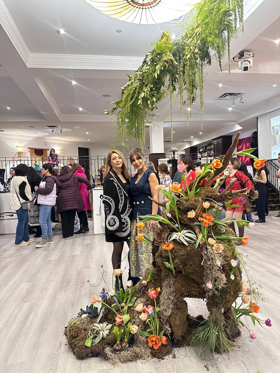 Persian-inspired floral sculpture with seasonal blooms at the Raavi Art Event in Toronto, created by Lotus Land  Flower Boutique
