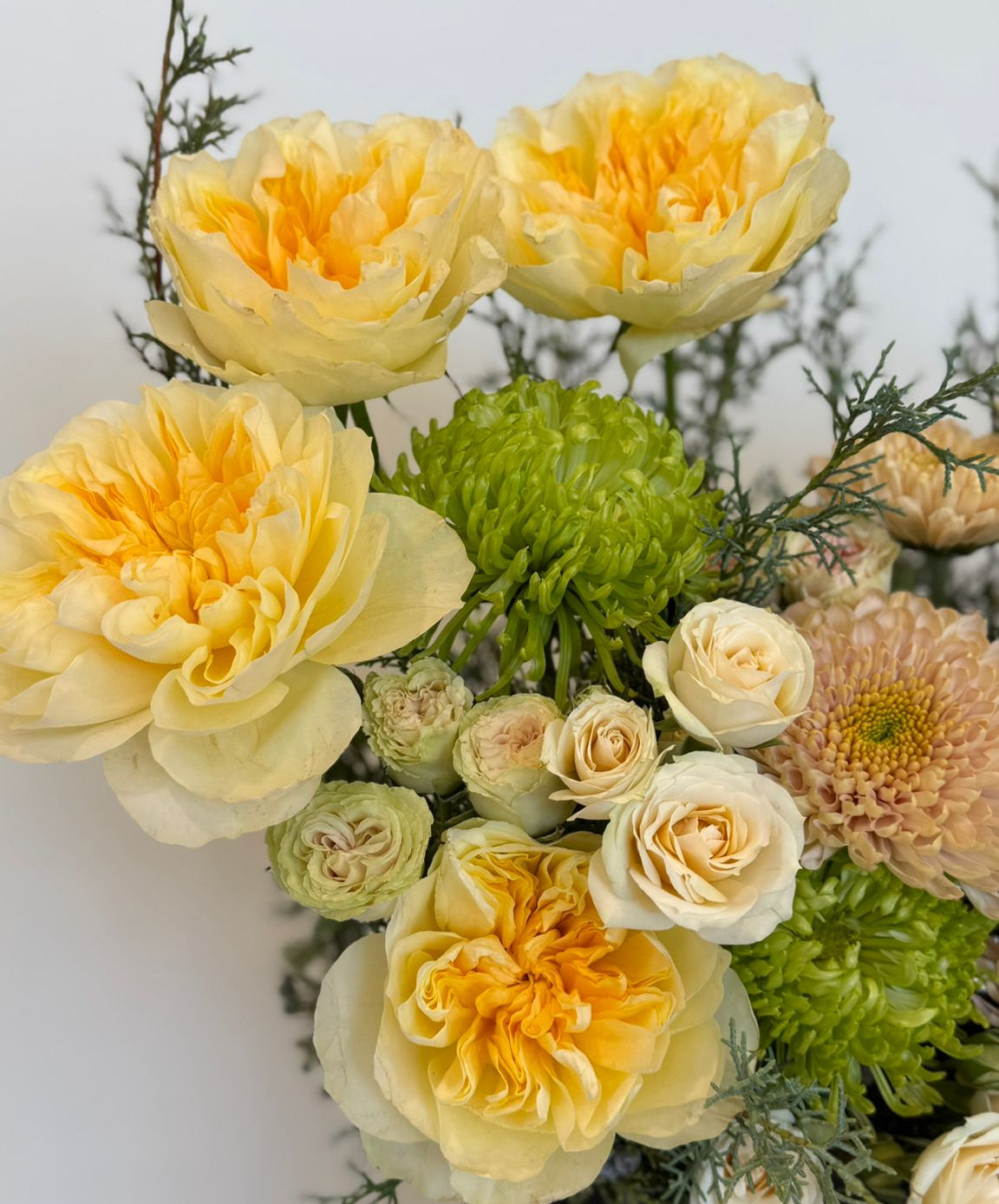 “Luxury yellow flower box with roses and seasonal flowers ”
