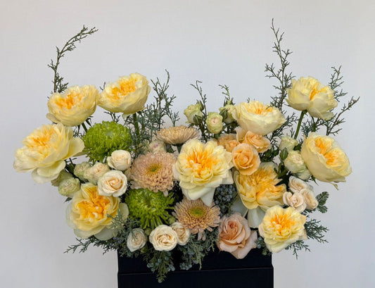 “Luxury yellow flower box with roses and seasonal flowers ”