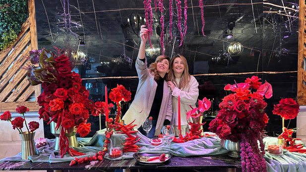 Contemporary red floral sculpture with roses, chili peppers, and textured styling for a luxury Valentine’s Day event in Toronto