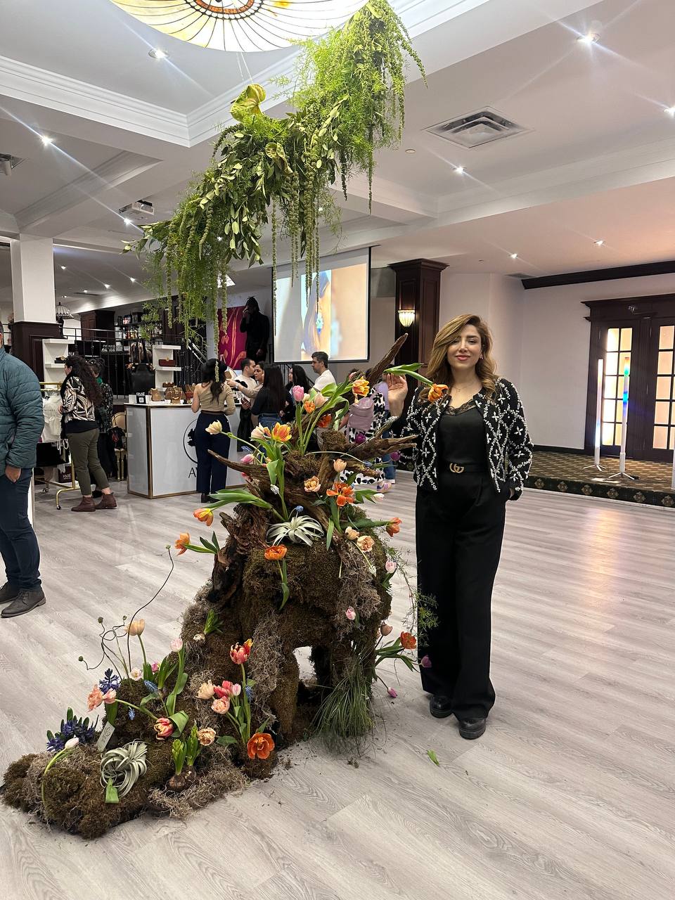 Persian-inspired floral sculpture with seasonal blooms at the Raavi Art Event in Toronto, created by Lotus Land  Flower Boutique