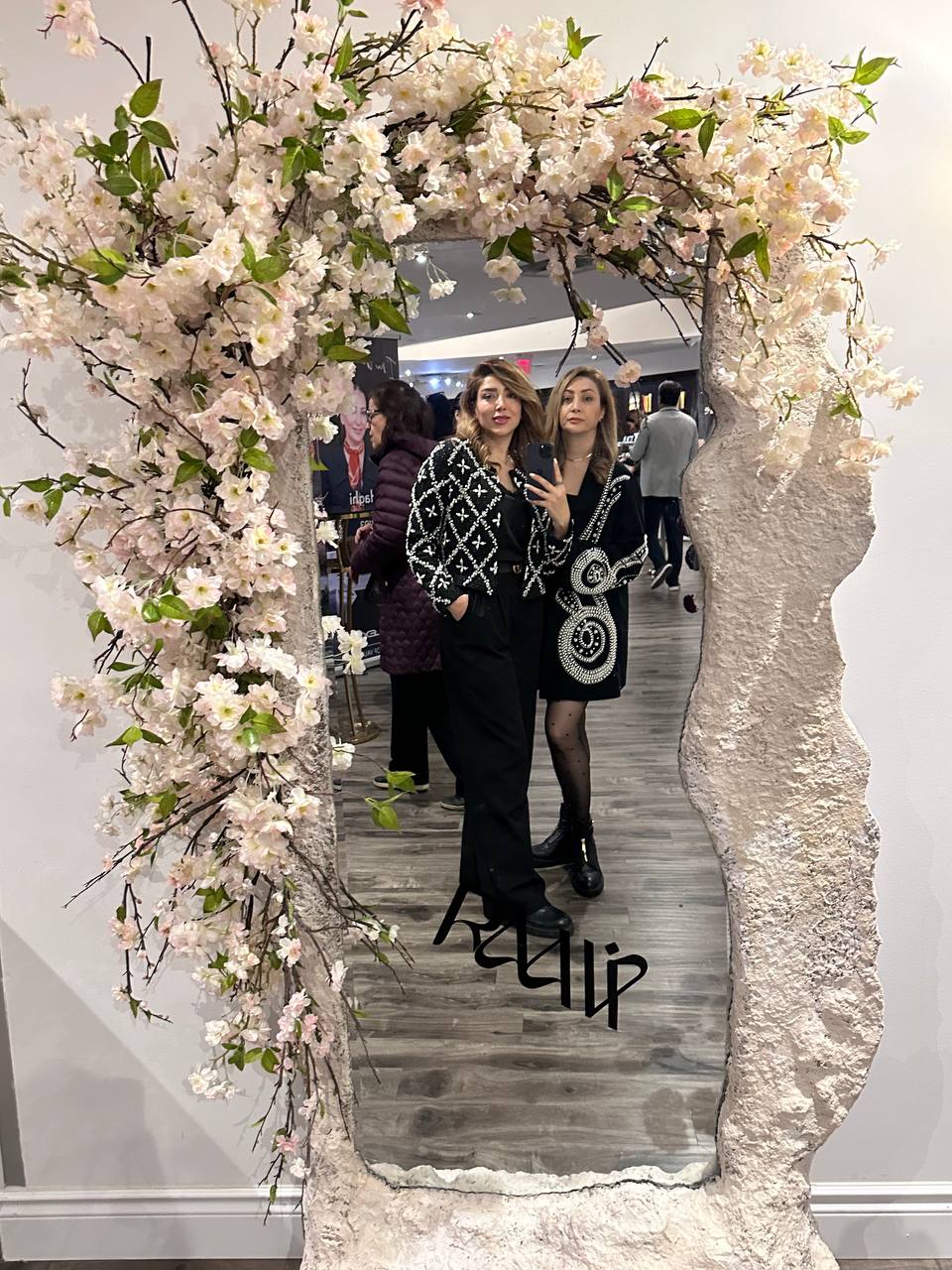 Persian-inspired floral sculpture with seasonal blooms at the Raavi Art Event in Toronto, created by Lotus Land  Flower Boutique
